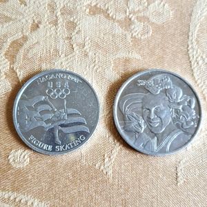 2 collectors coins,space jam &1998 figure skating